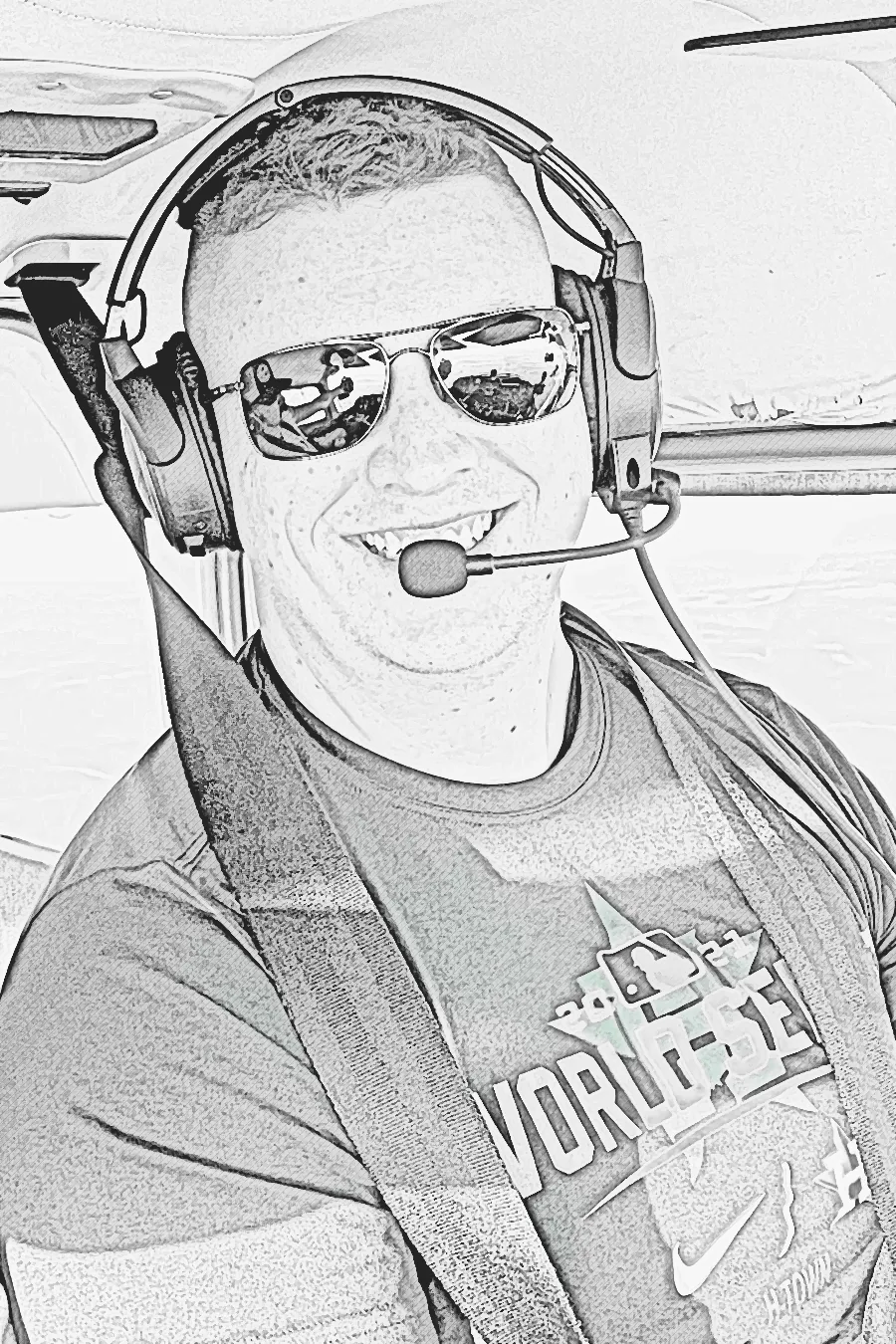 Charcoal sketch of Brandon flying with an aviation headset and shoulder harness.
